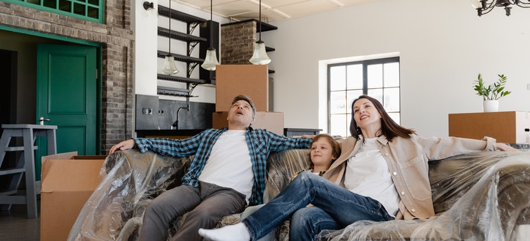 pexels mart production 7415099 family enjoying themselves as movers Melbourne FL handle verything related to their relocation