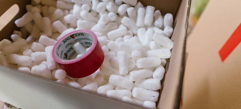 324333 Stuffed cardboard box and packing tape