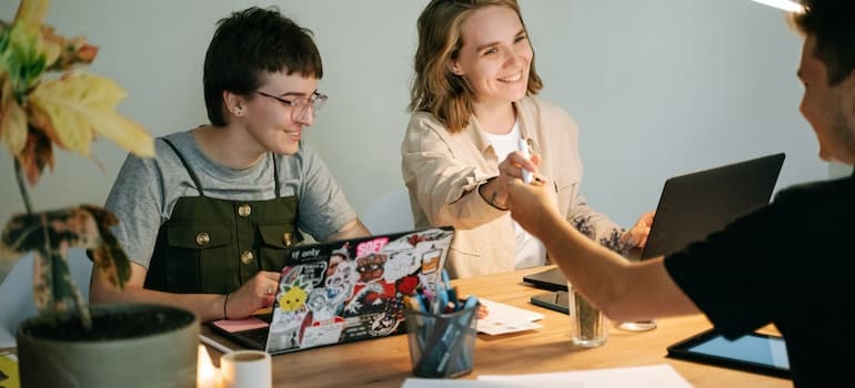 2 A group of people spending time in Palma Ceia, which is the answer to the question of where do millennials live in Tampa.